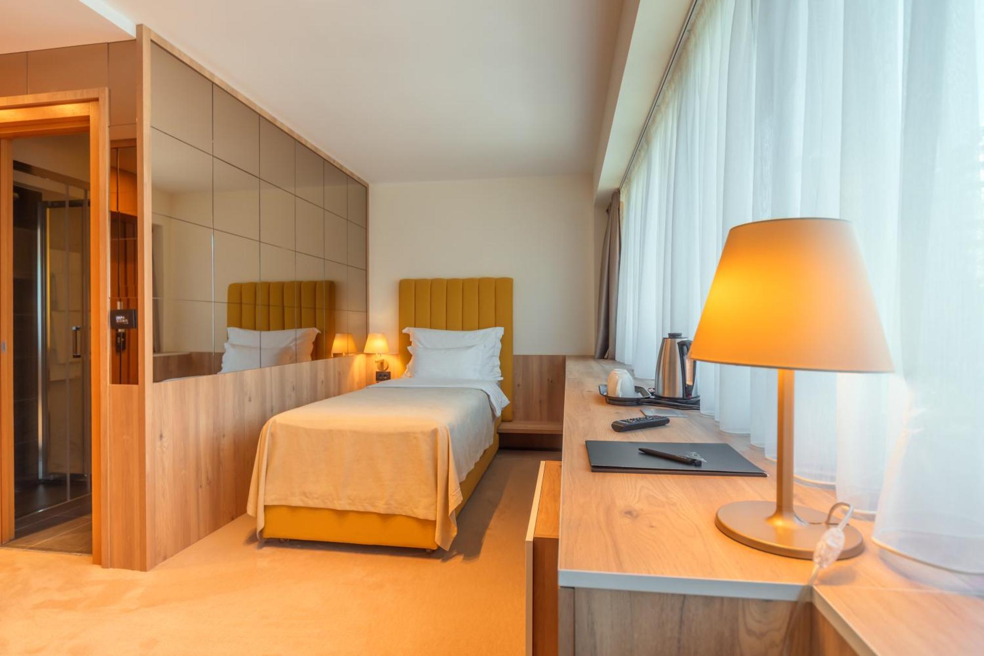 Hotel Agape Bar Pokoj fotografie